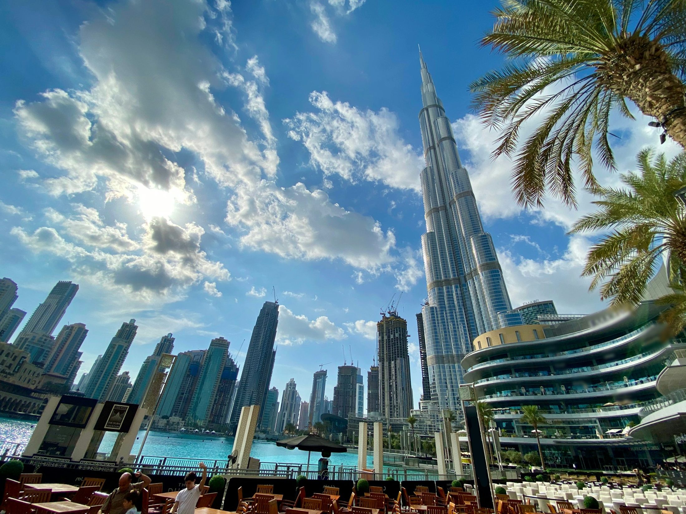 Dubai skyline with Burj Khalifa and palm trees